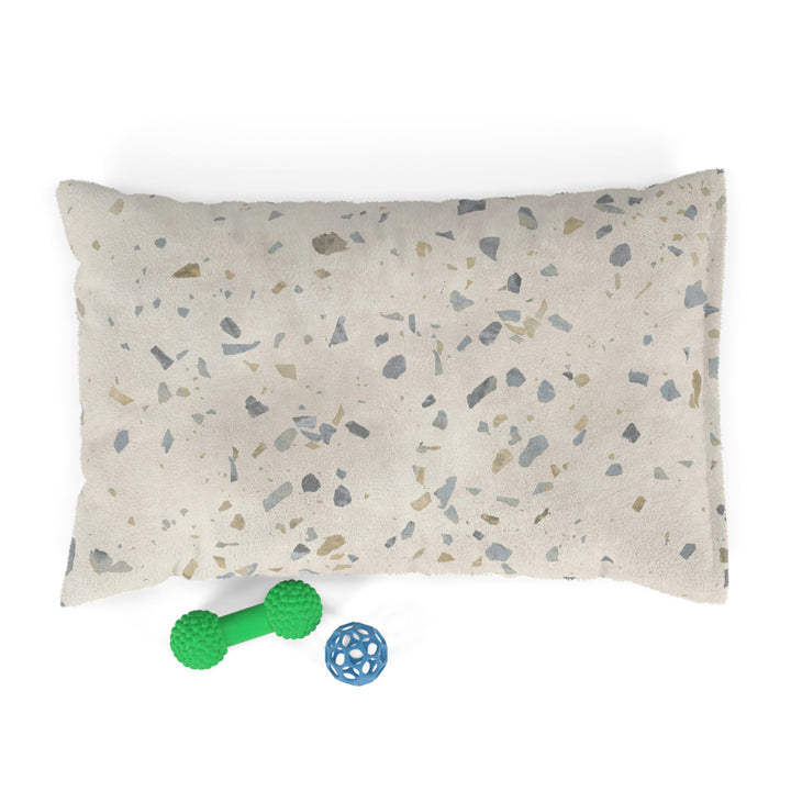 Small dog bed in Ultima Earl Grey terrazzo design with dog toys