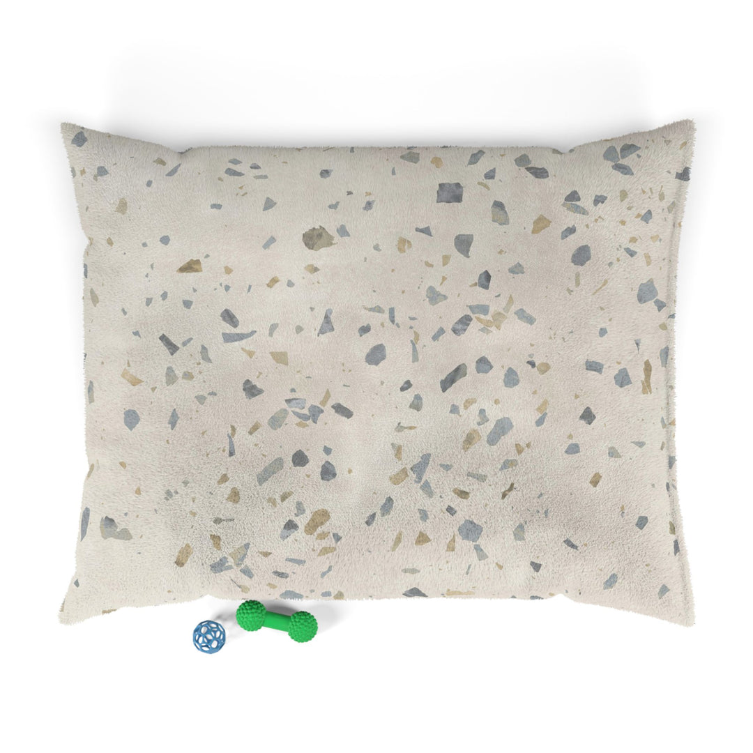 Large dog bed in Ultima Earl Grey terrazzo design with dog toys