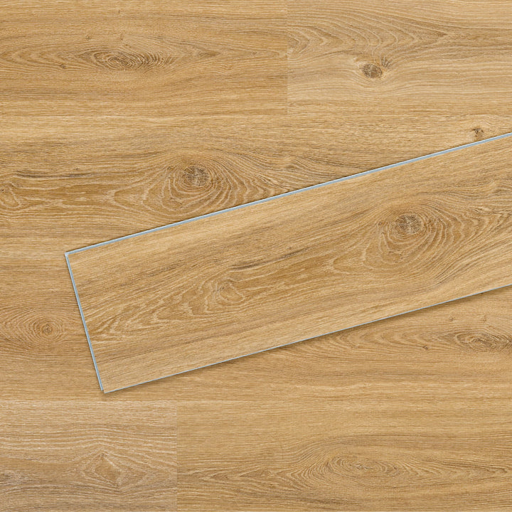 Allure Vinyl Flooring in Contemporary Oak Cappuccino installed floor view from above with close up of single plank laying on top showing grooves and edges