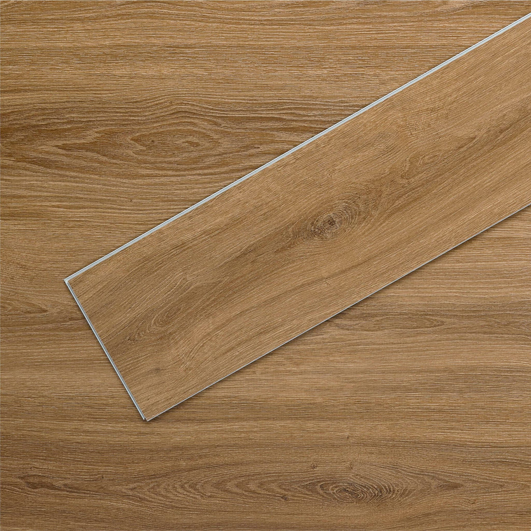 AllureLVP Flooring in Contemporary Oak Mocha installed floor view from above with close up of single plank laying on top showing grooves and edges