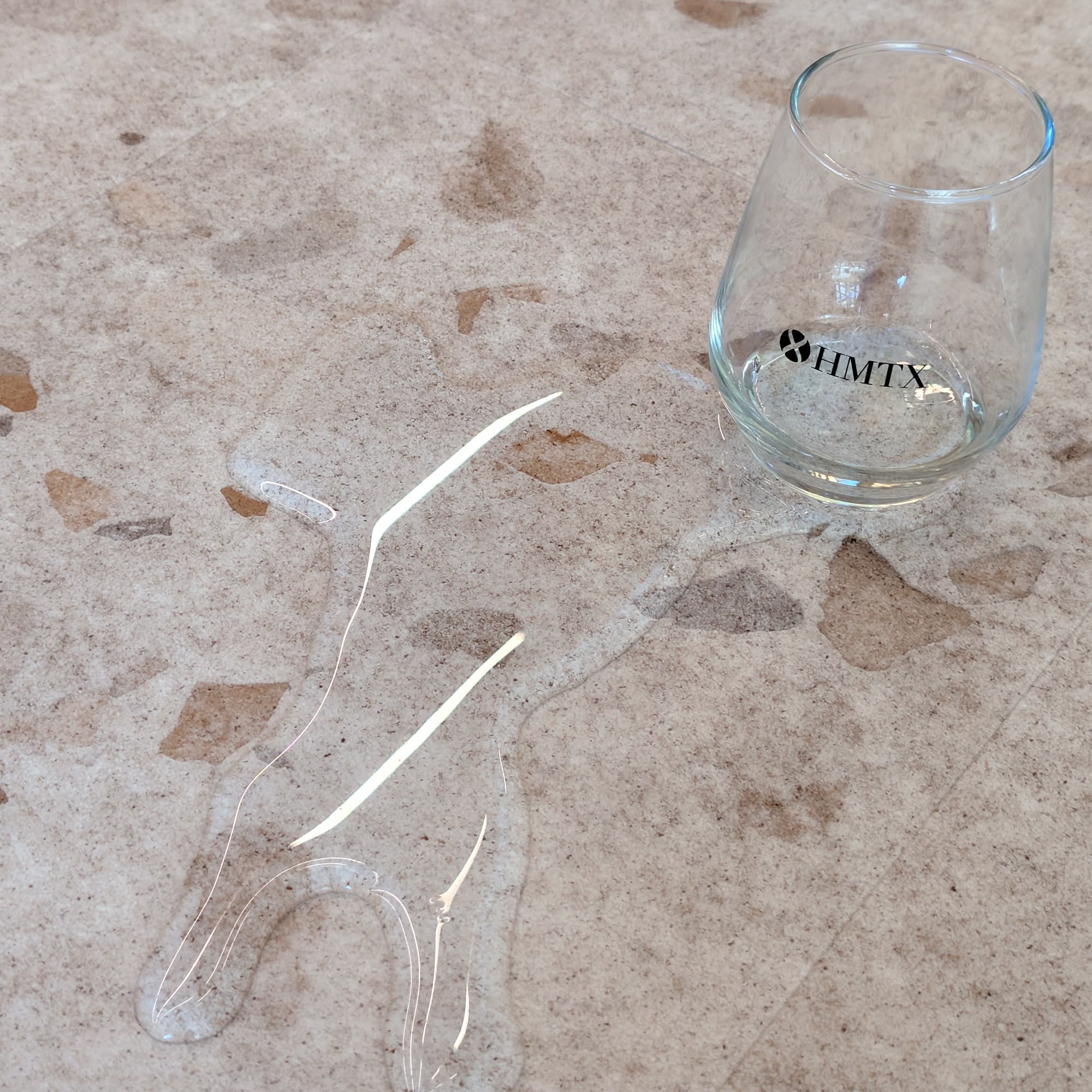 Water glass spilled on Allure terrazzo LVT flooring