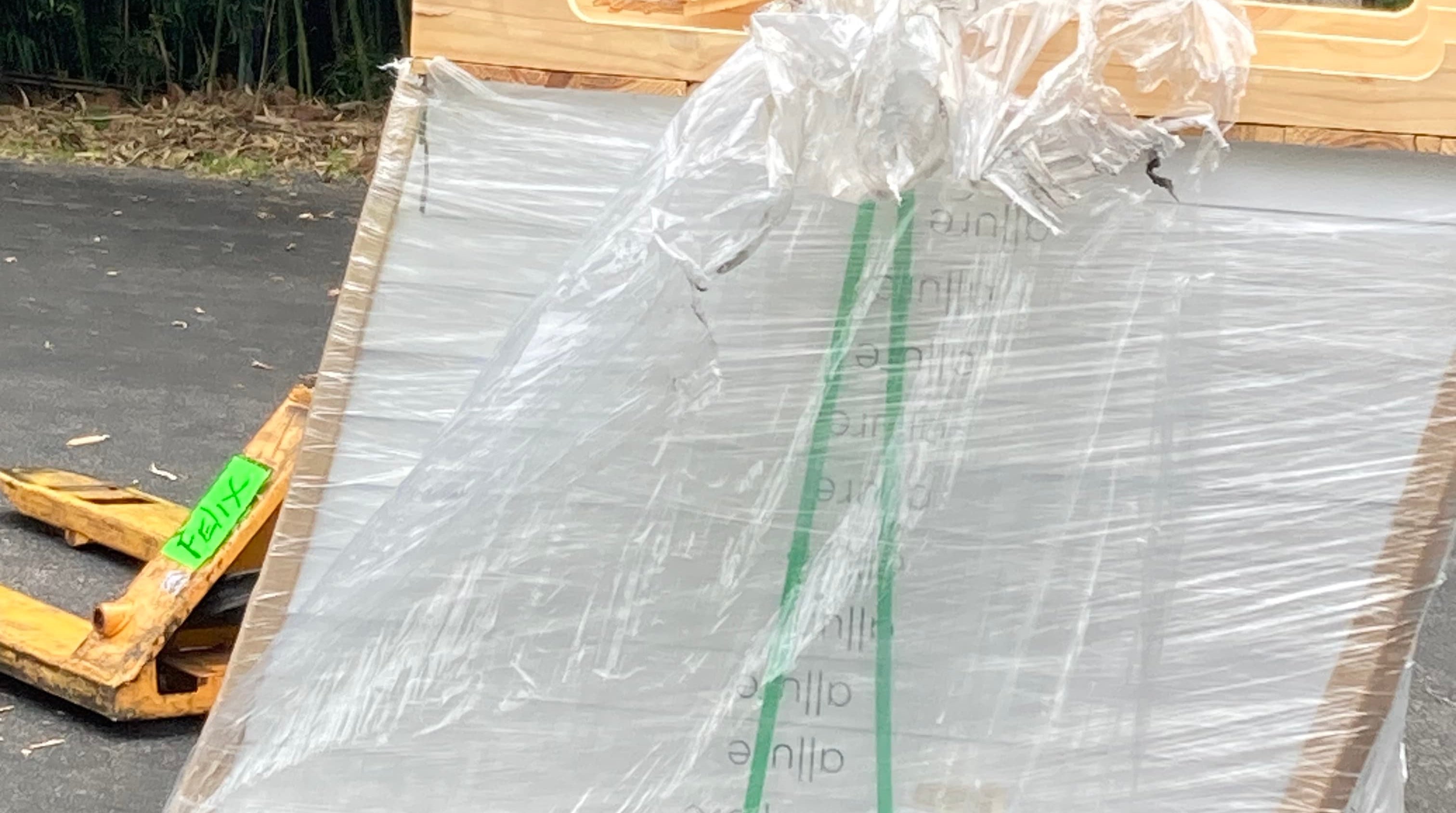 a pallet of flooring on a pallet jack