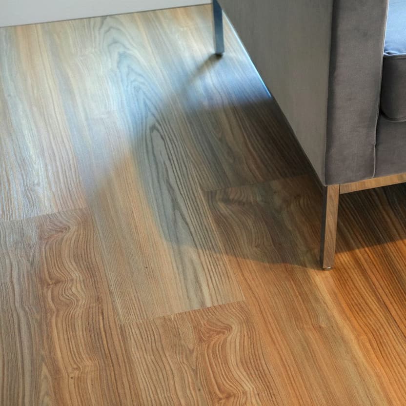 Allure Peach Crisp Pine LVP with gray chair