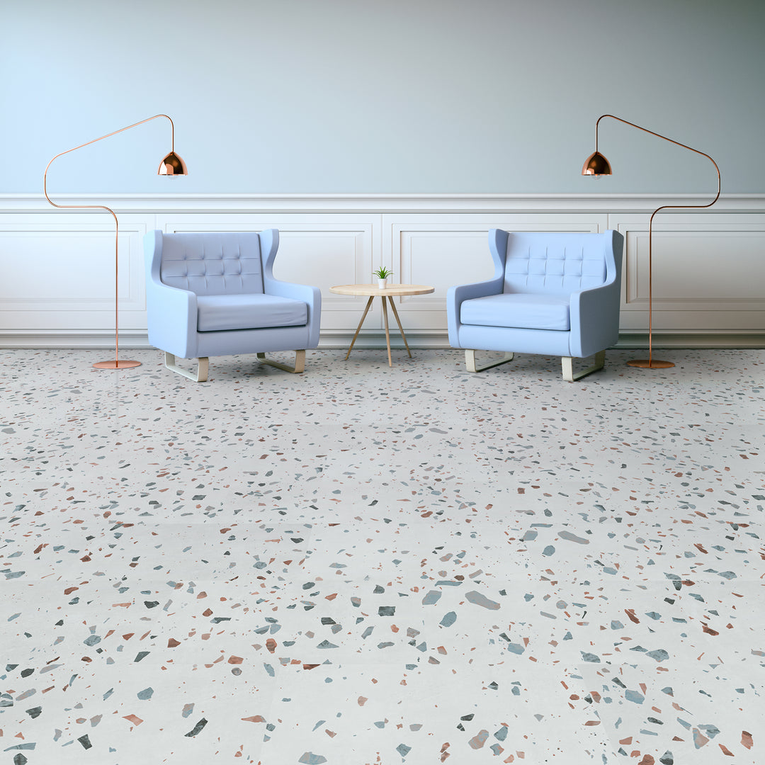 Ultima earl grey terrazzo installed in room with blue chairs and chair rail