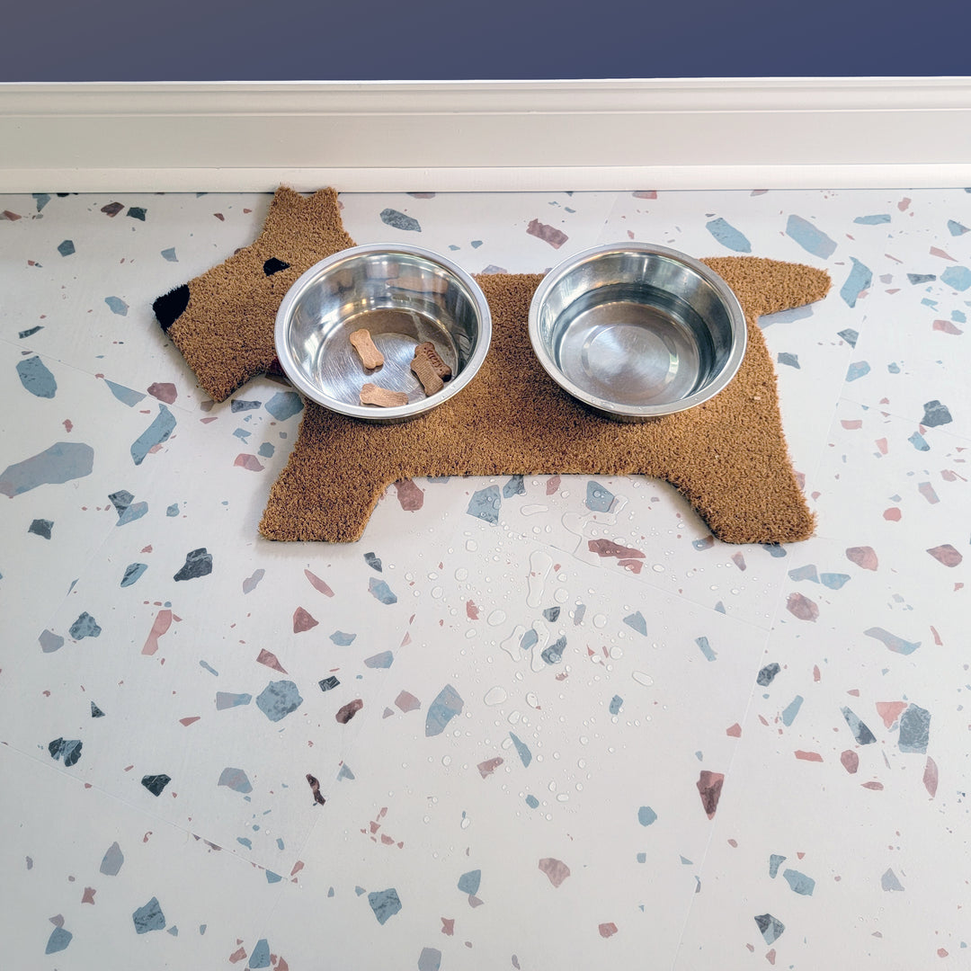 Earl Grey terrazzo vinyl tiles with dog mat, dog bowls , treats and spilled water