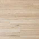 Close-up of a Allure green tea tulip vinyl plank floor with a natural finish