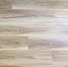 Almond honey aspen Allure LVP with a light brown wood shown installed from above