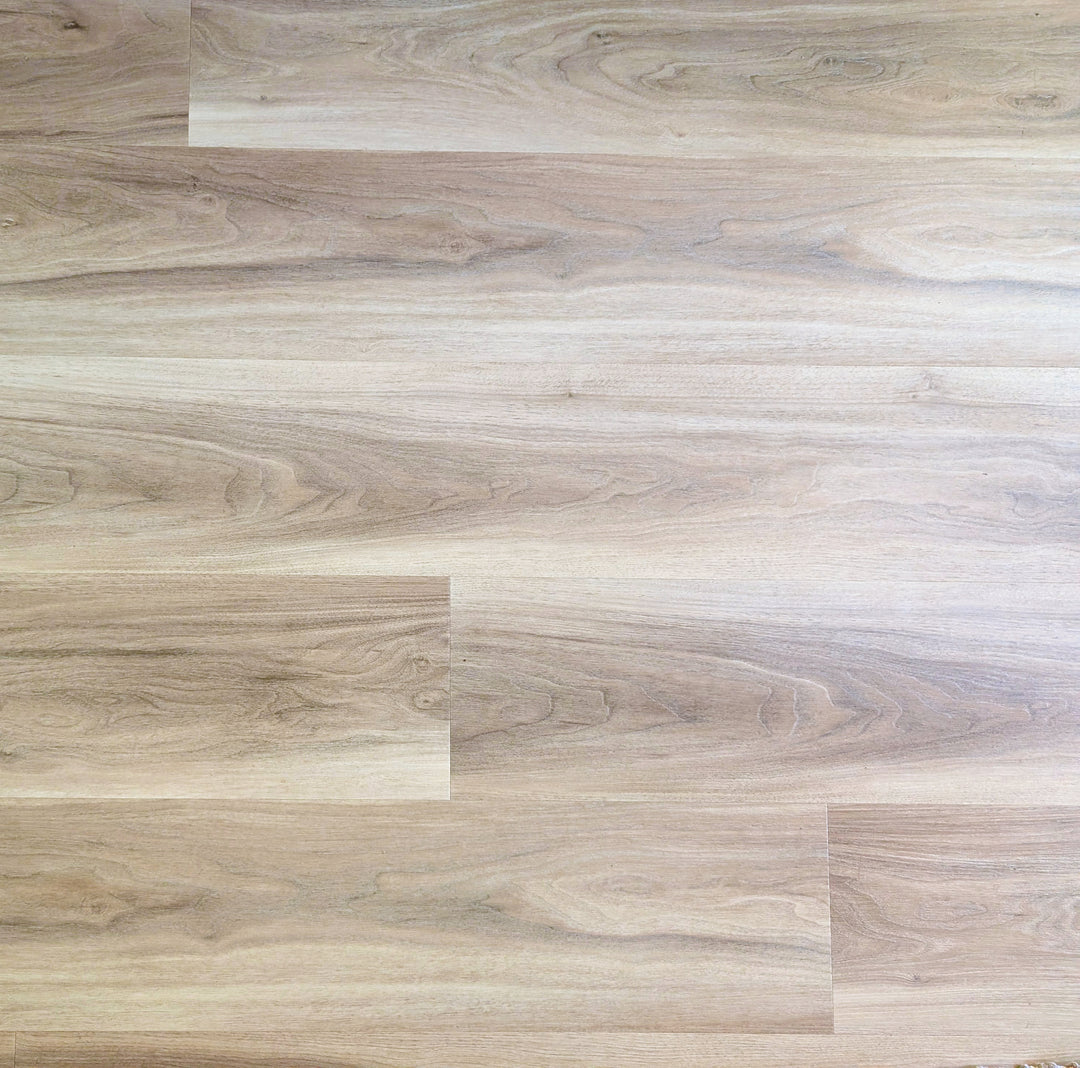 Almond honey aspen Allure LVP with a light brown and gray color scheme