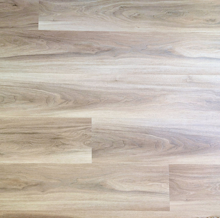 Almond honey aspen Allure LVP with a light brown and gray color scheme
