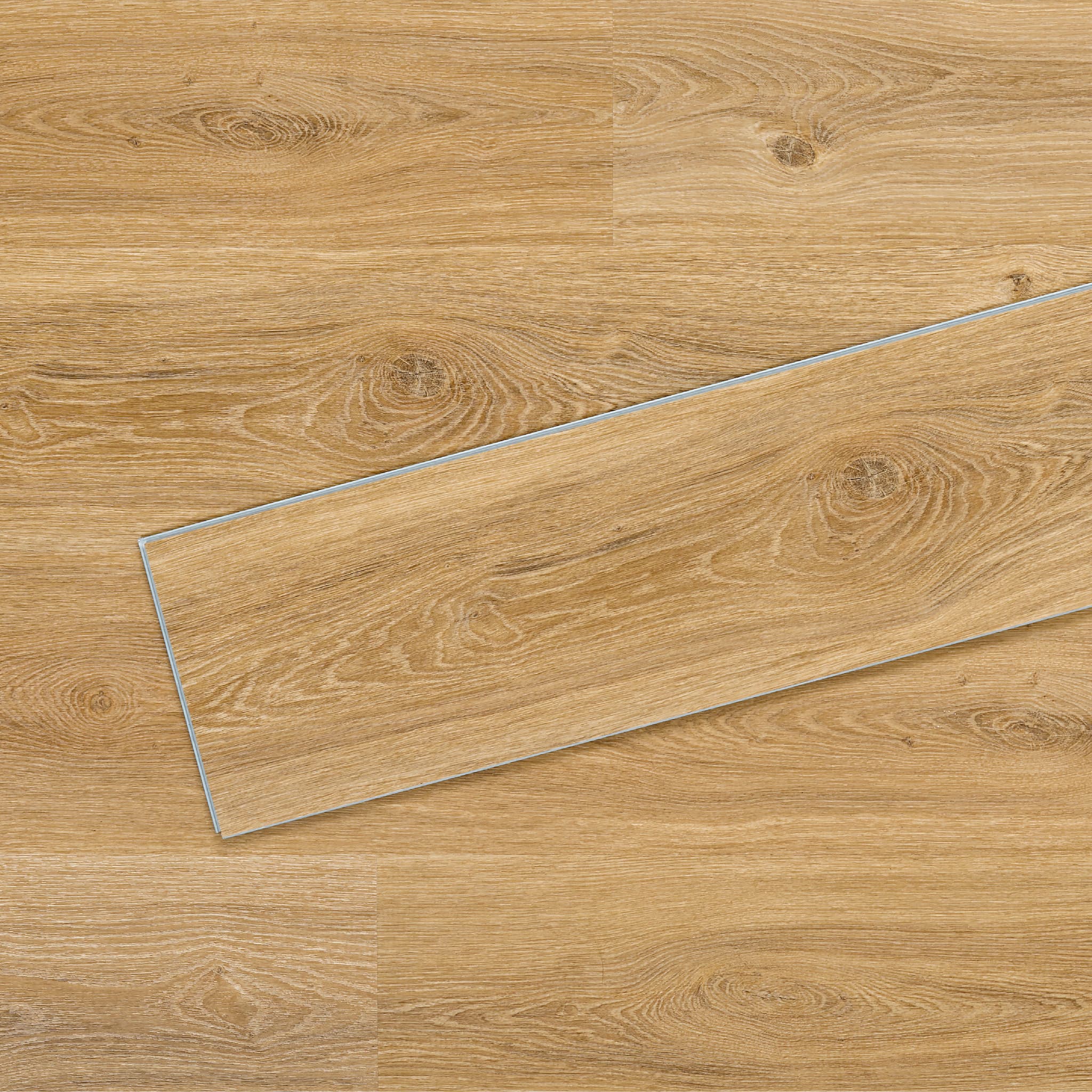 Allure Vinyl Flooring in Contemporary Oak Cappuccino installed floor view from above with close up of single plank laying on top showing grooves and edges