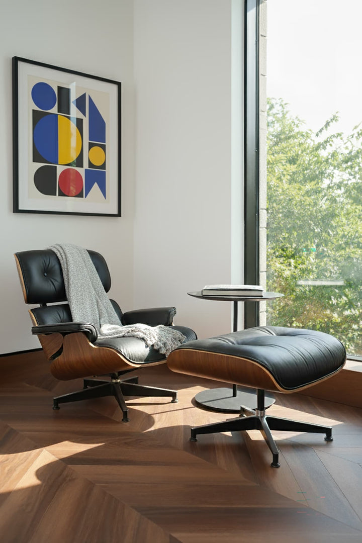 MCM chair on Allure isocore vinyl flooring in chevron pattern with abstract wall art