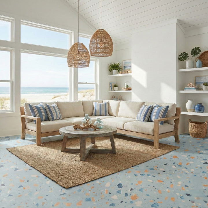 Beach house living room with a sectional sofa, coffee table, and decorative items on Allure blue agave terrazzo LVT flooring