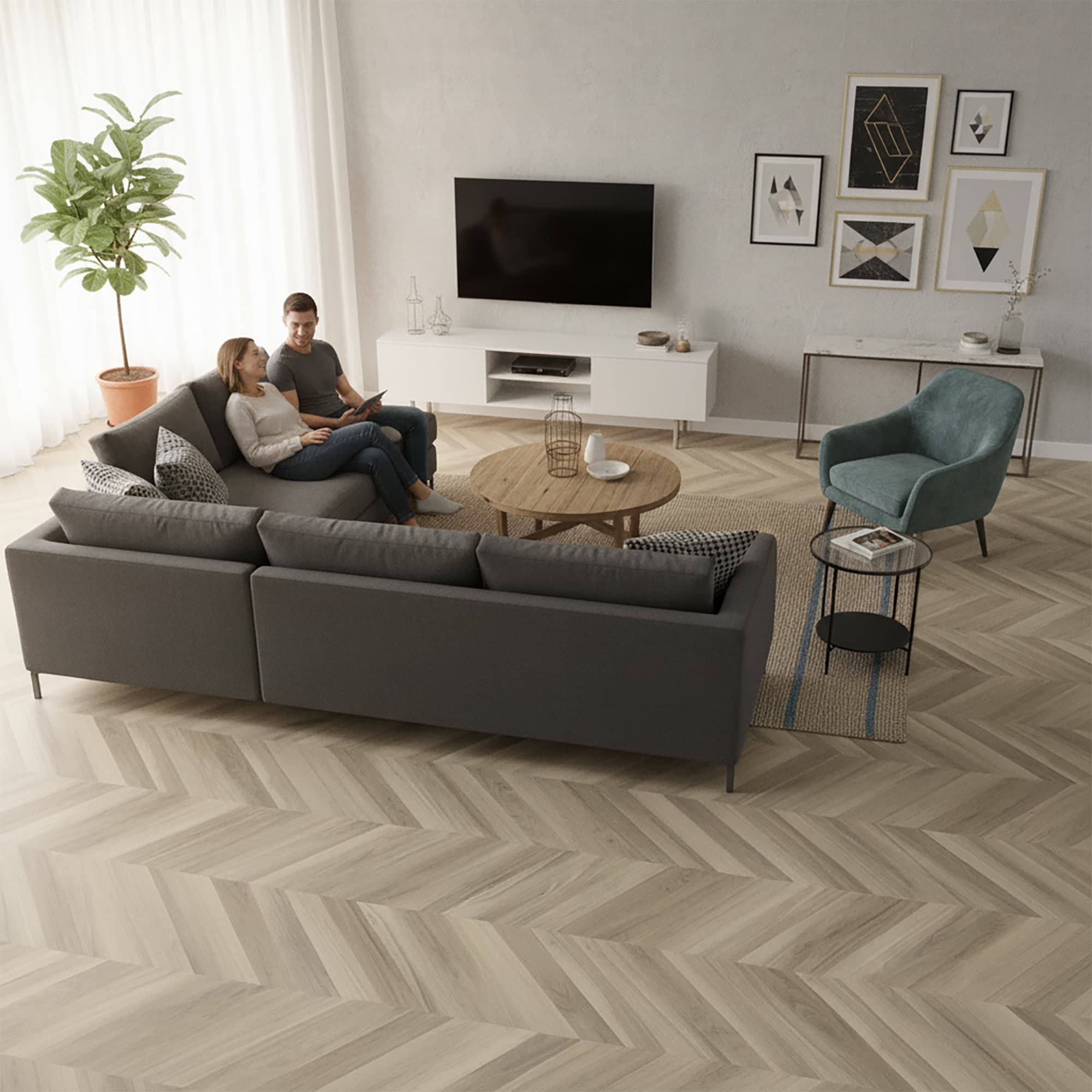 Living room with a gray sectional sofa, coffee table, and TV stand with allure chevron flooring
