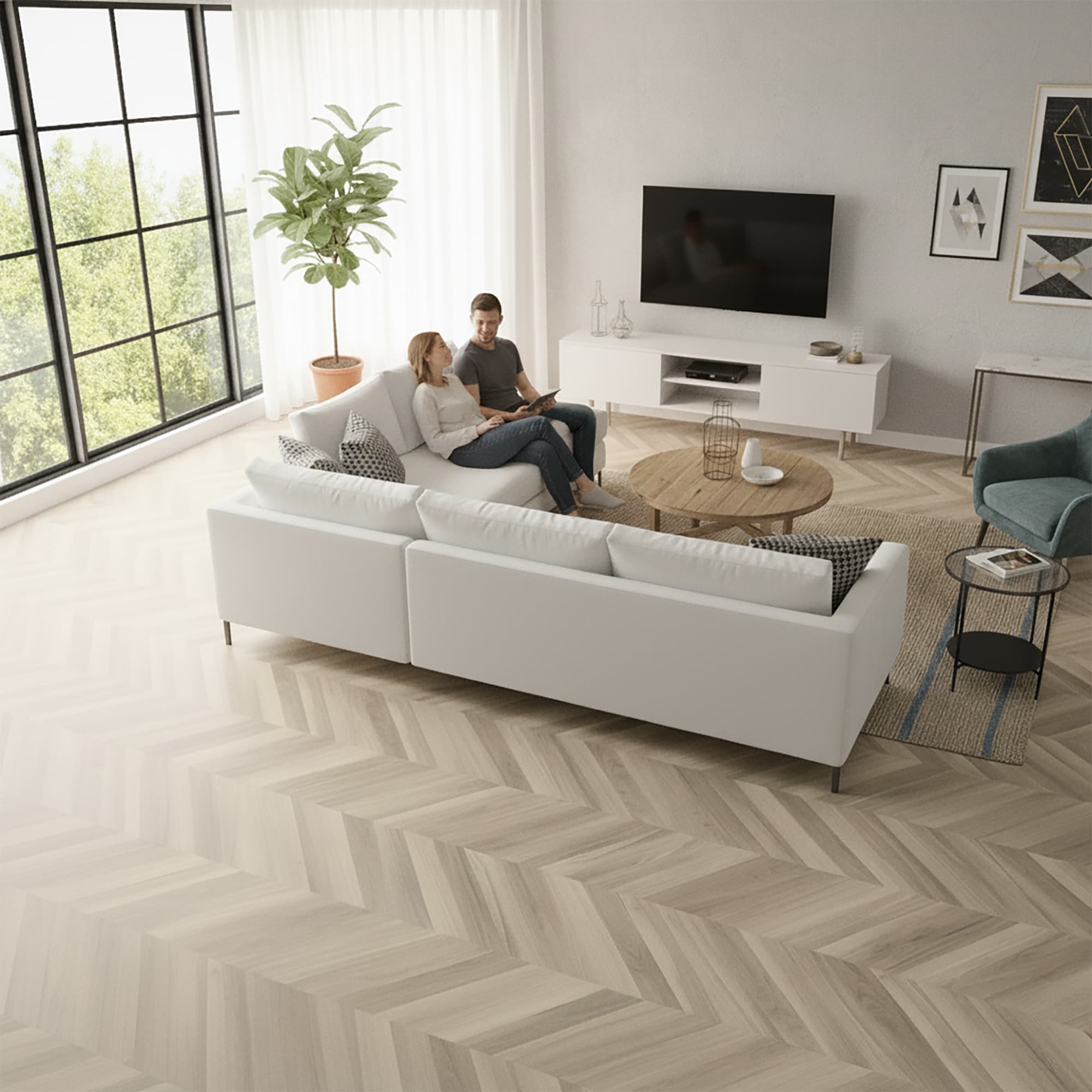 modern bright living room scene with a couple sitting on a couch and Allure chevron flooring