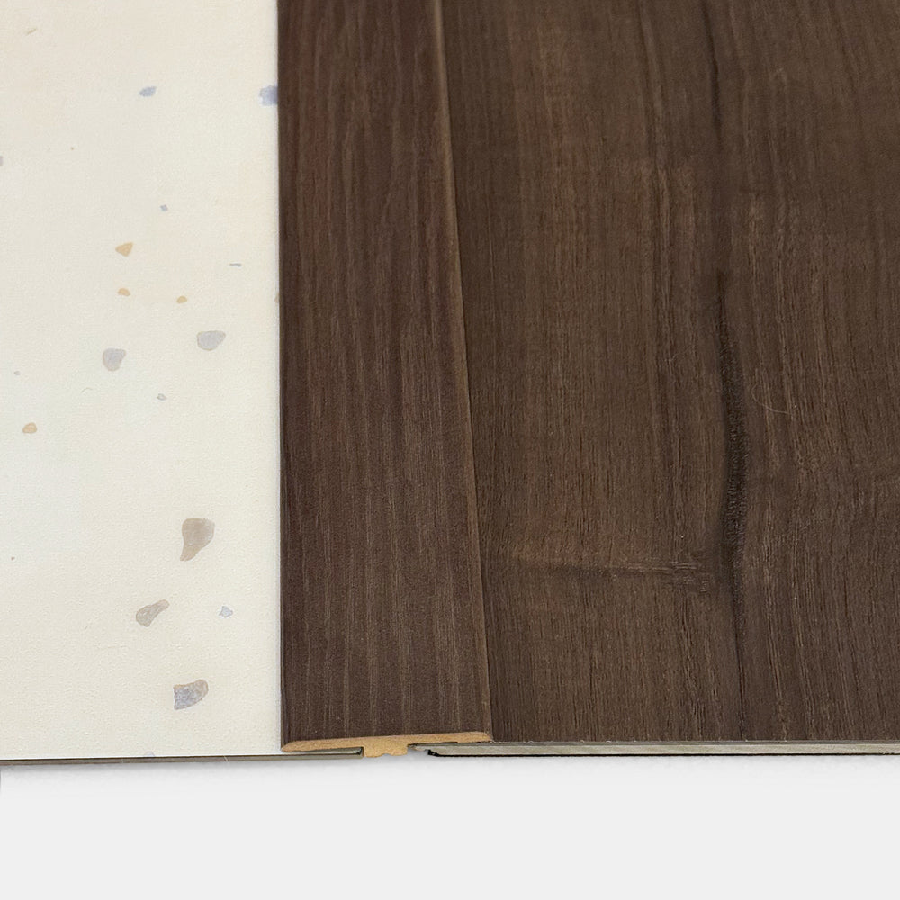 Transition strip between Burnt Butter Walnut LVP and Terrazzo LVP