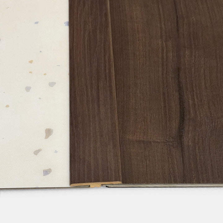 Transition strip between Burnt Butter Walnut LVP and Terrazzo LVP
