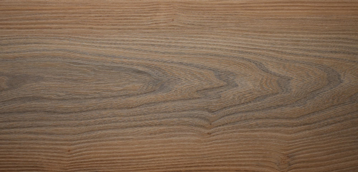 Close-up of a vinyl flooring with wooden surface with visible grain and texture in cool light