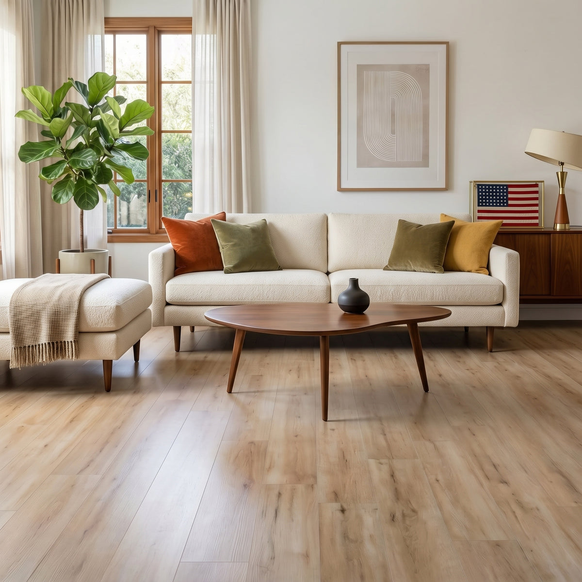 Chess pie hickory vinyl flooring in a bright, modern living room with a cream sofa, wooden coffee table, and neutral decor.