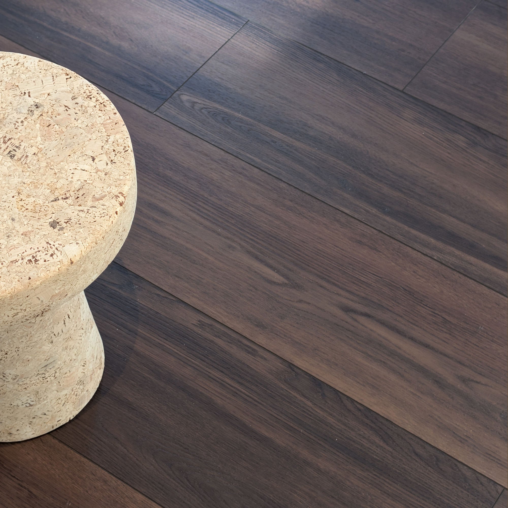 dark wood Allure lvp flooring with cork side table