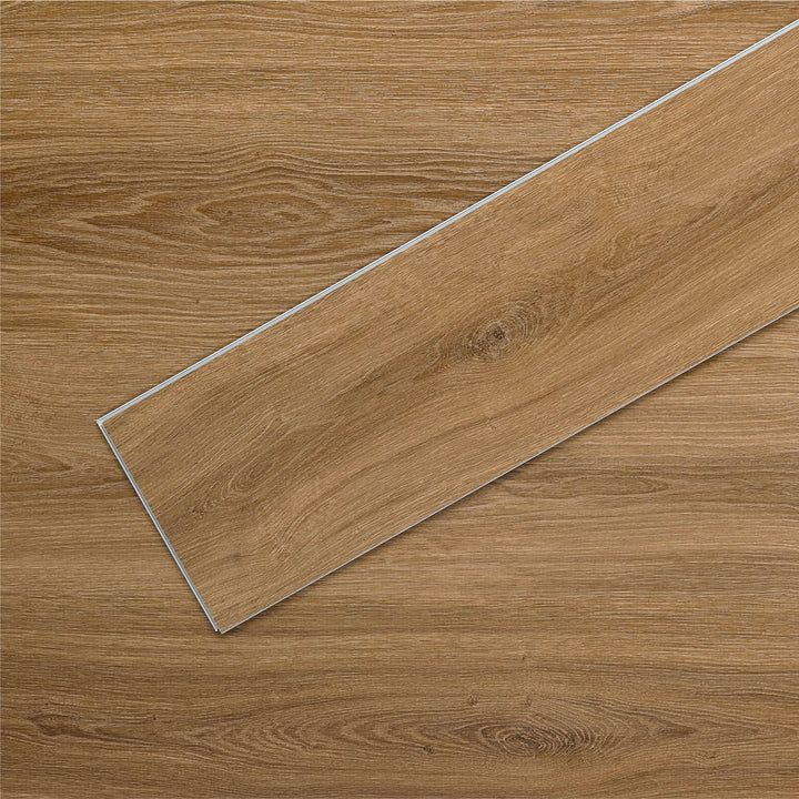AllureLVP Flooring in Contemporary Oak Mocha installed floor view from above with close up of single plank laying on top showing grooves and edges