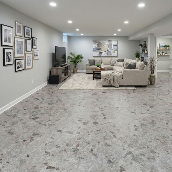 Allure Galaway Grey terrazzo LVT with cork backing in a modern basement with neutral furniture