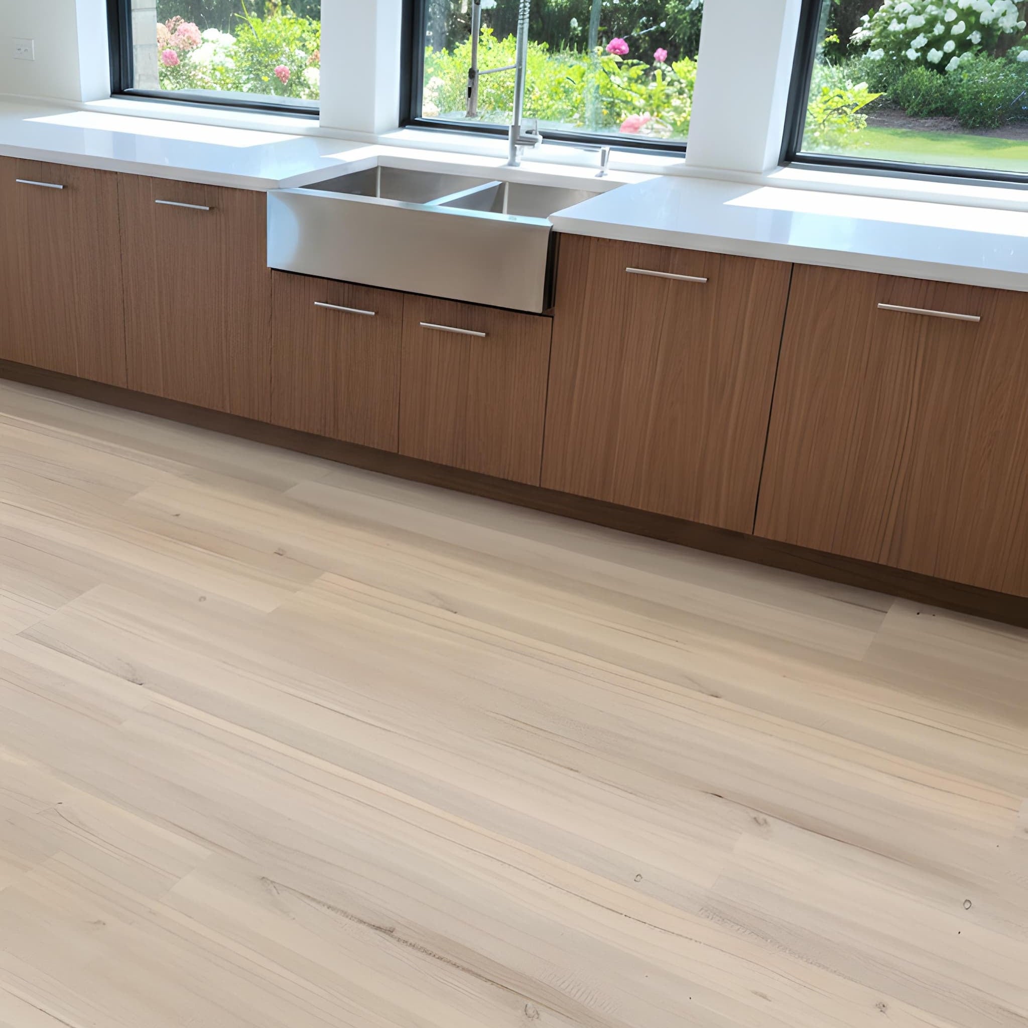 Modern kitchen with Allure LVP flooring, wooden cabinets and a stainless steel sink.