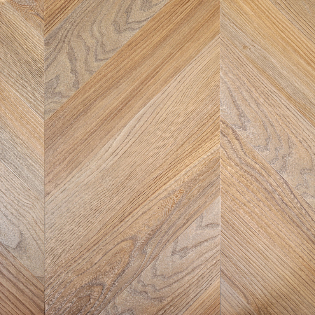 Close up of Peach Crips Pine Chevron Vinyl Flooring