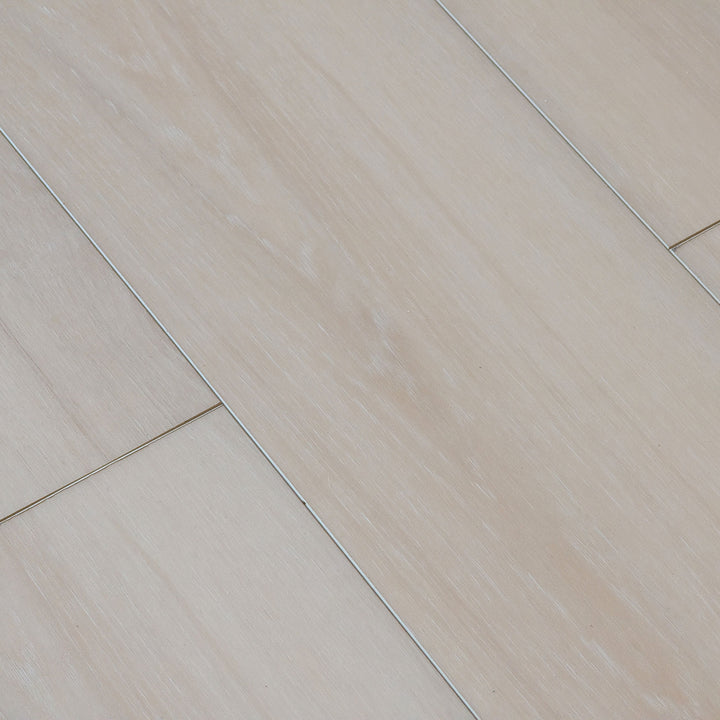 close up of Allure pound cake pecan vinyl flooring with painted bevels