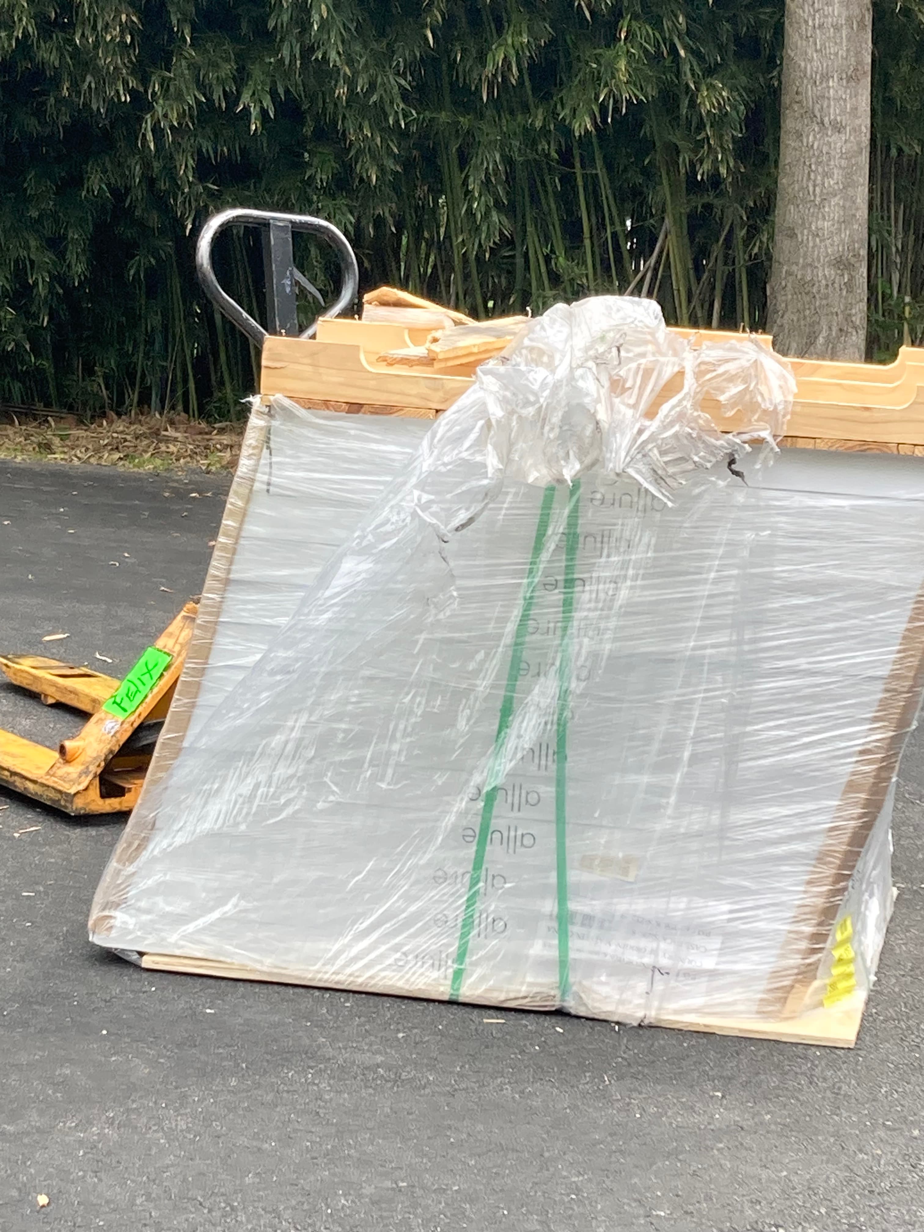 a pallet of flooring on a pallet jack