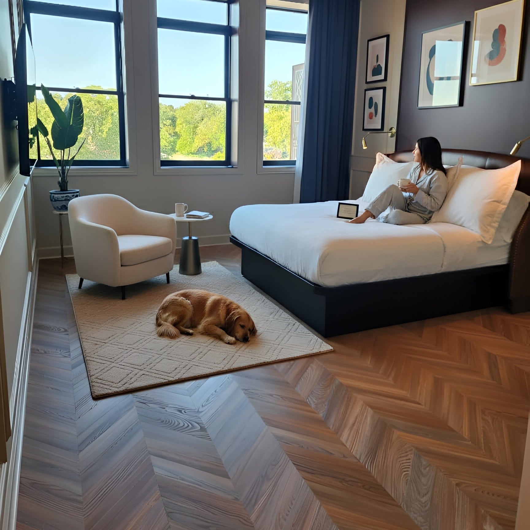 Peach Crisp Pine Chevron installed in a modern bedroom with a large bed, armchair, and window view