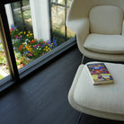 Velvet Mocha Flooring with white chair overlooking a garden