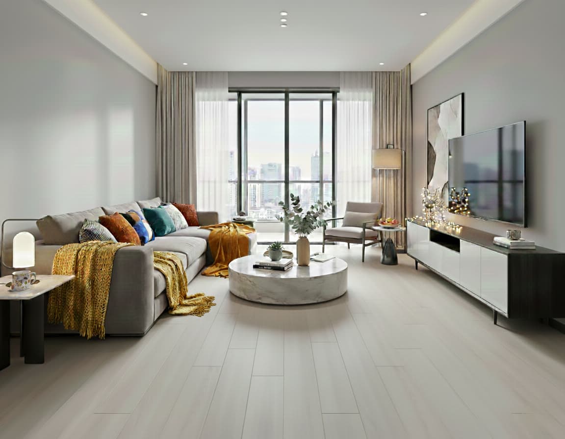 Modern living room with a gray sofa, coffee table, and TV.